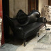 Black Tufted Leather Wing Couch